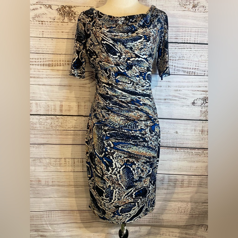 Woman’s multi colored pencil dress size 4 petite